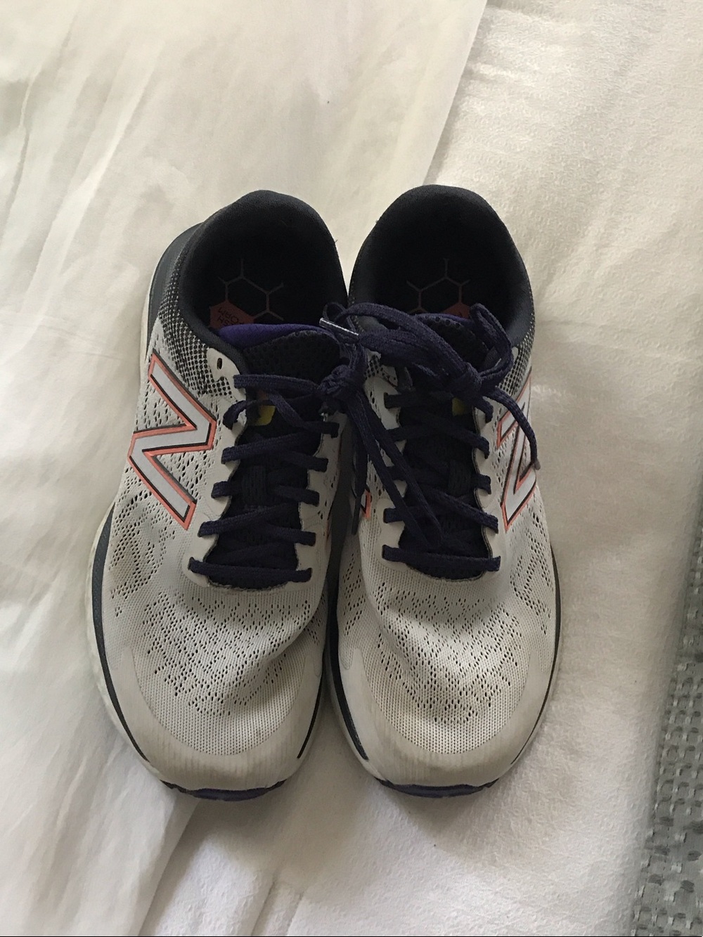 Unisex New Balance White Sneakers with Purple Laces and Pink-Orange Logo